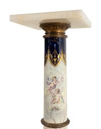 A Sèvres Style Porcelain, Gilt Bronze and Onyx Pedestal
