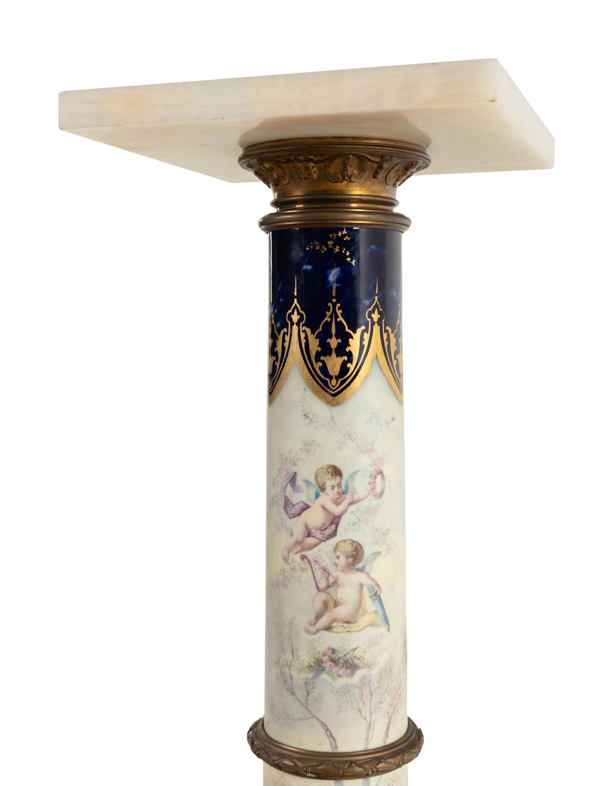 A Sèvres Style Porcelain, Gilt Bronze and Onyx Pedestal