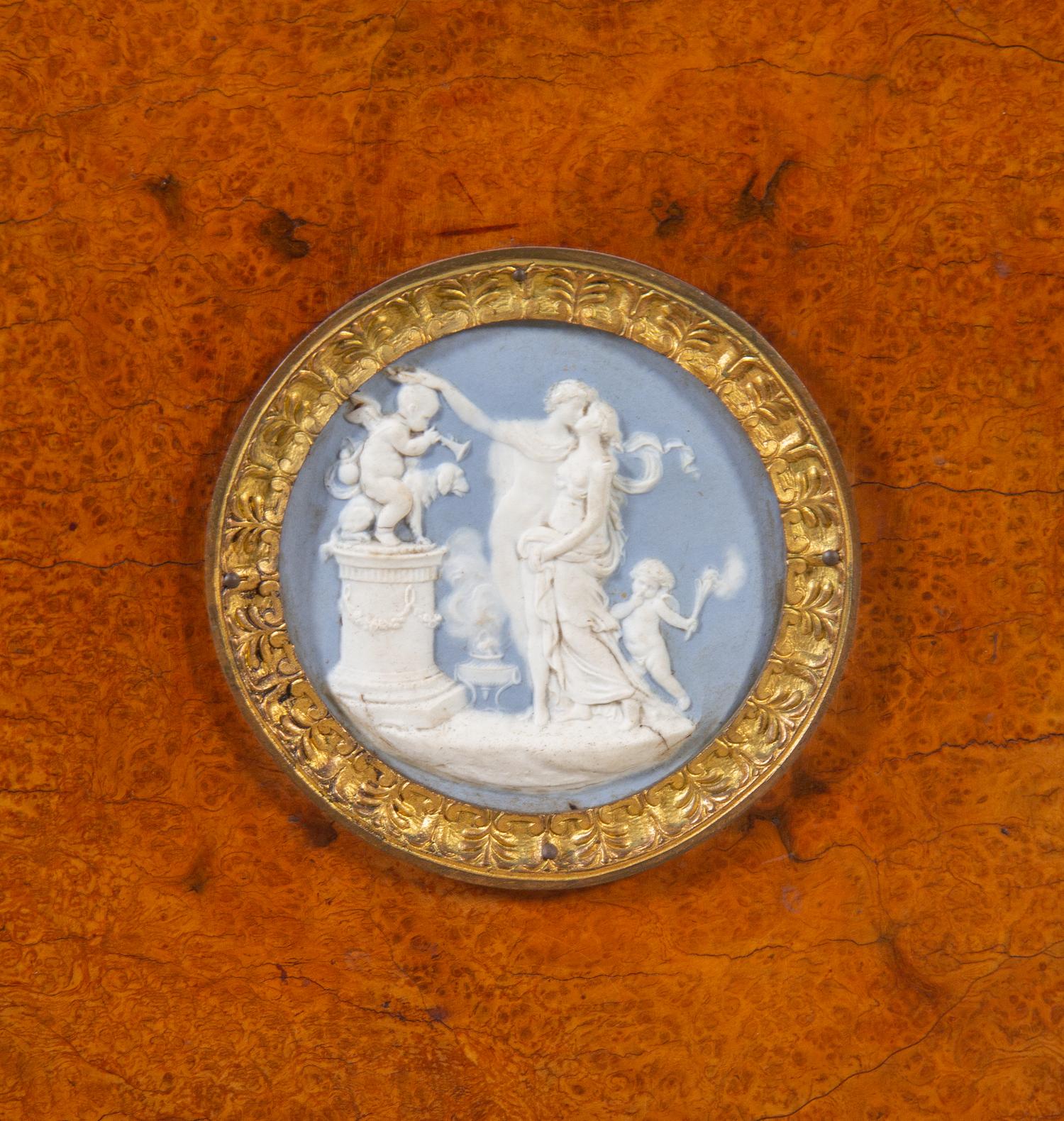 A French Gilt Bronze and Jasperware Mounted Burlwood Dining Suite