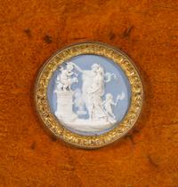A French Gilt Bronze and Jasperware Mounted Burlwood Dining Suite