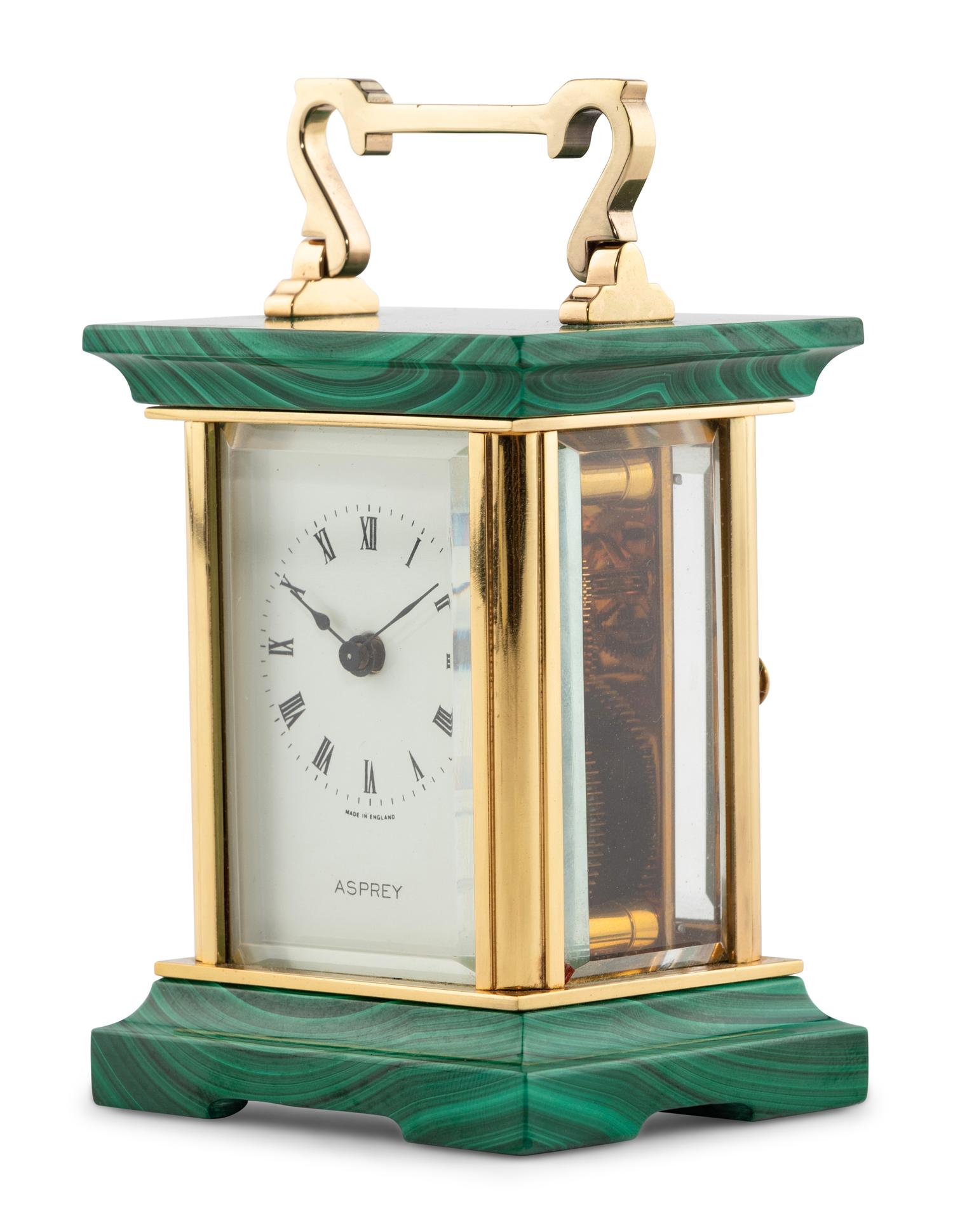 An Asprey and Co. Malachite and Brass Carriage Clock