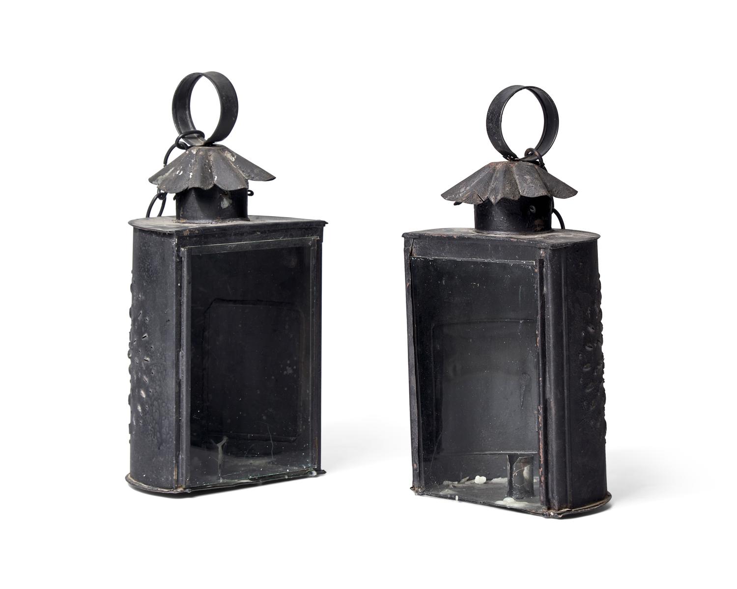 A Pair of Hanging Pierced Tinware and Glass Lanterns