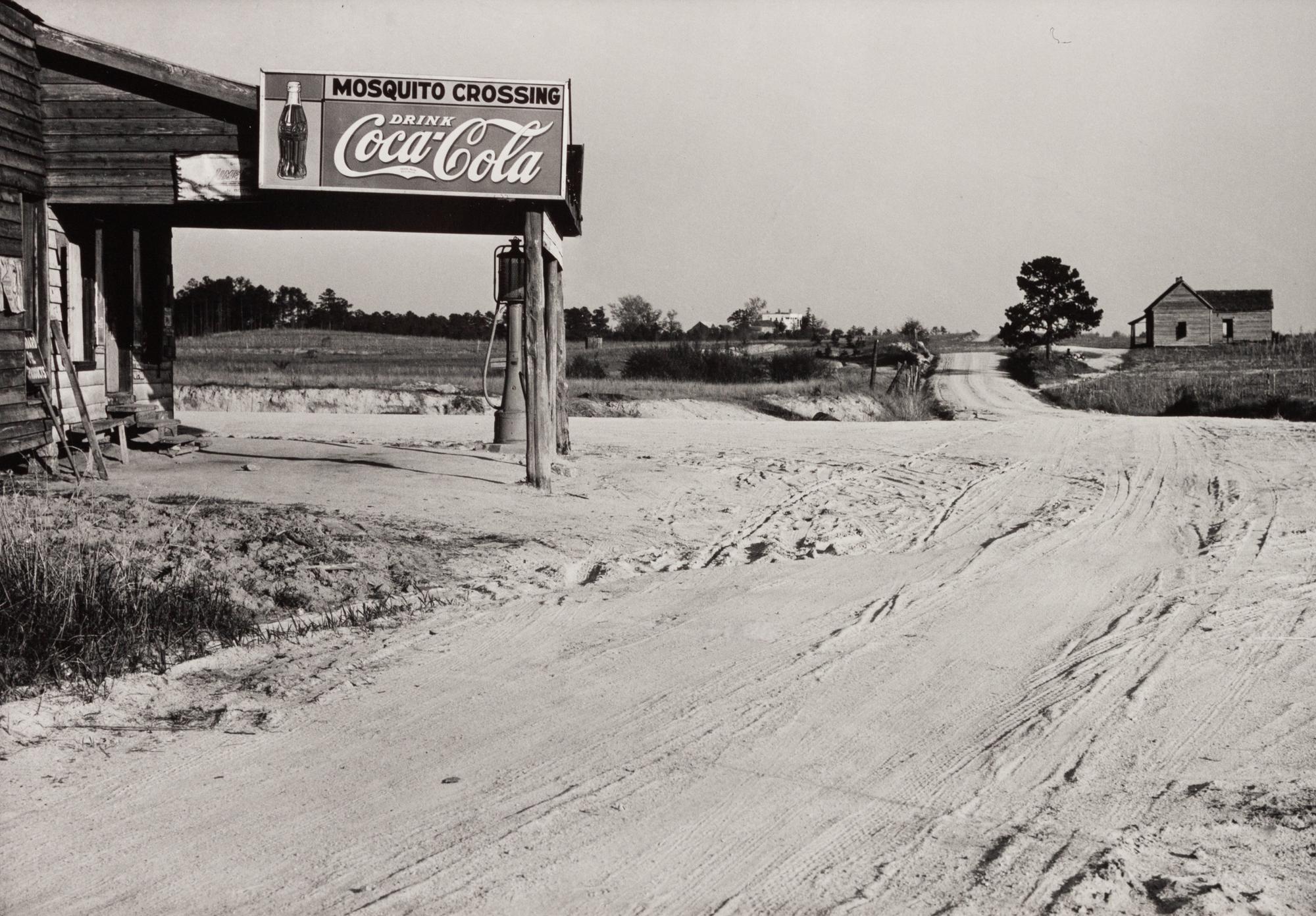 A group of five photographs ( A member of the Wilkins Family Making Biscuits , 1939; Post Office in Blizzard, Aspen, CO , 1941; Negro (Black) Man Entering Movie Theater by Colored Entrance, Belzoni, Miss., 1939; Crossroad and General Store (Mosquito Crossing) Near Greensboro, GA, 1939 (printed 1981); Recreation Evening at Community School Under Direction of WPA Recreational Supervisor (in suit and tie) Coffee County, Alabama, 1939)