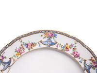 A Sèvres Porcelain Plate Later Decorated to Match the 'Service P etits Vases et Guirlandes' Ordered for the Comtesse Du Barry