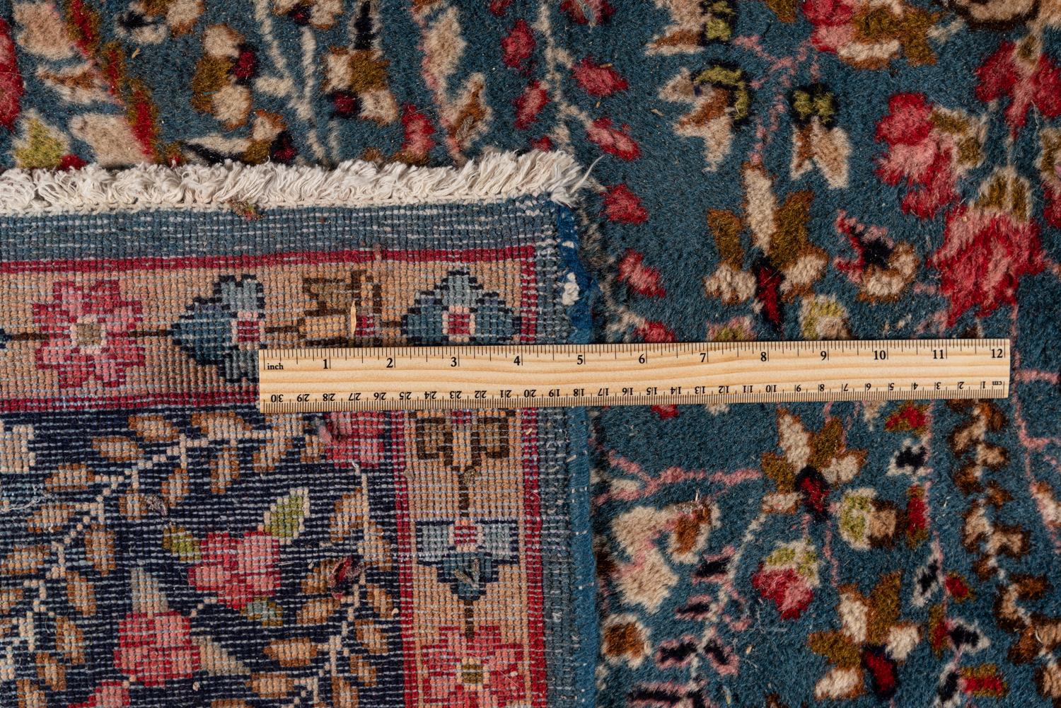 A Kirman Wool Rug