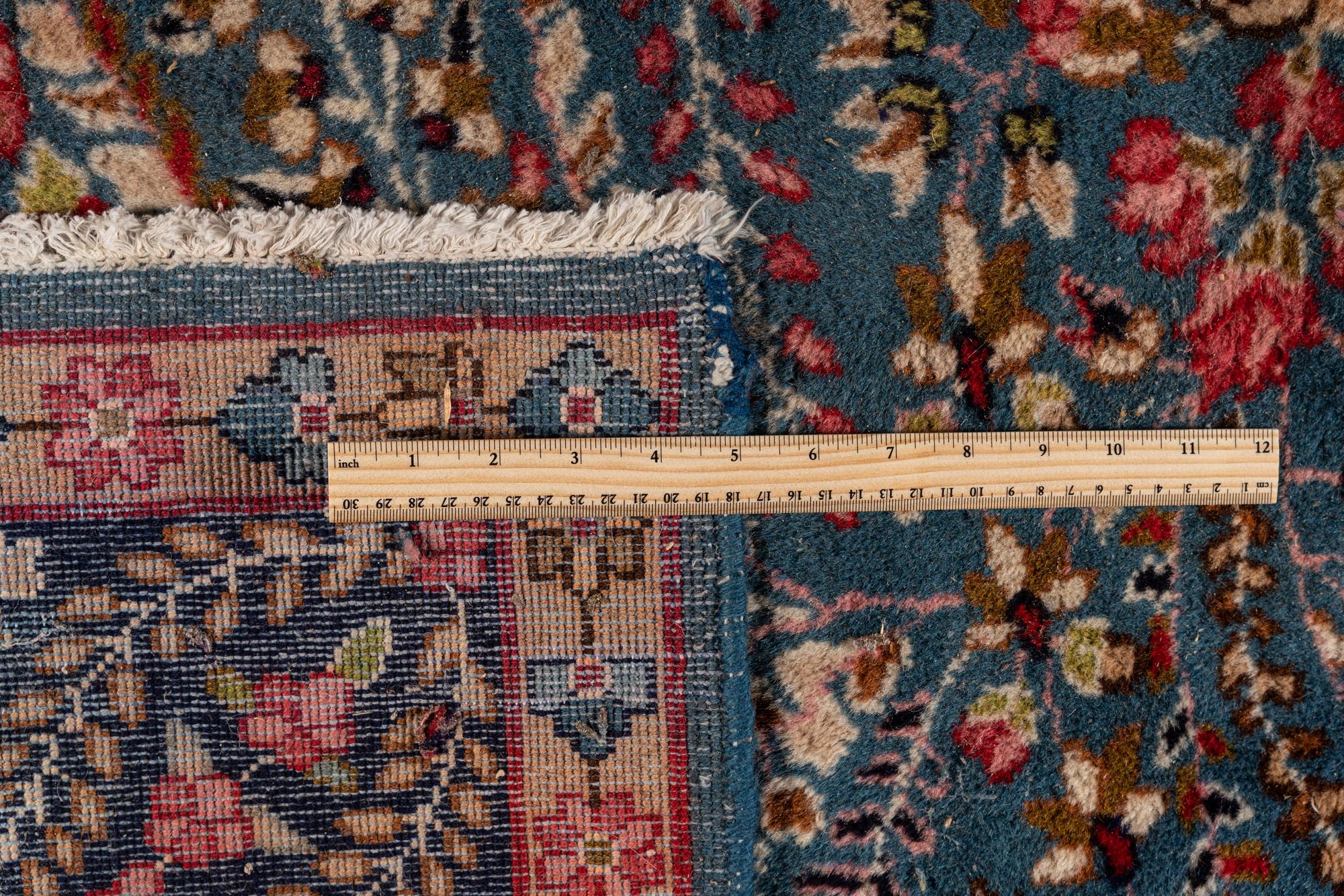 A Kirman Wool Rug