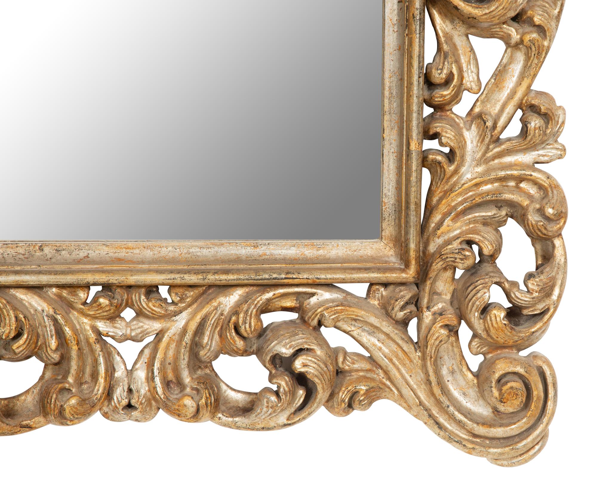 An Italian Rococo Style Silvered Wood Mirror