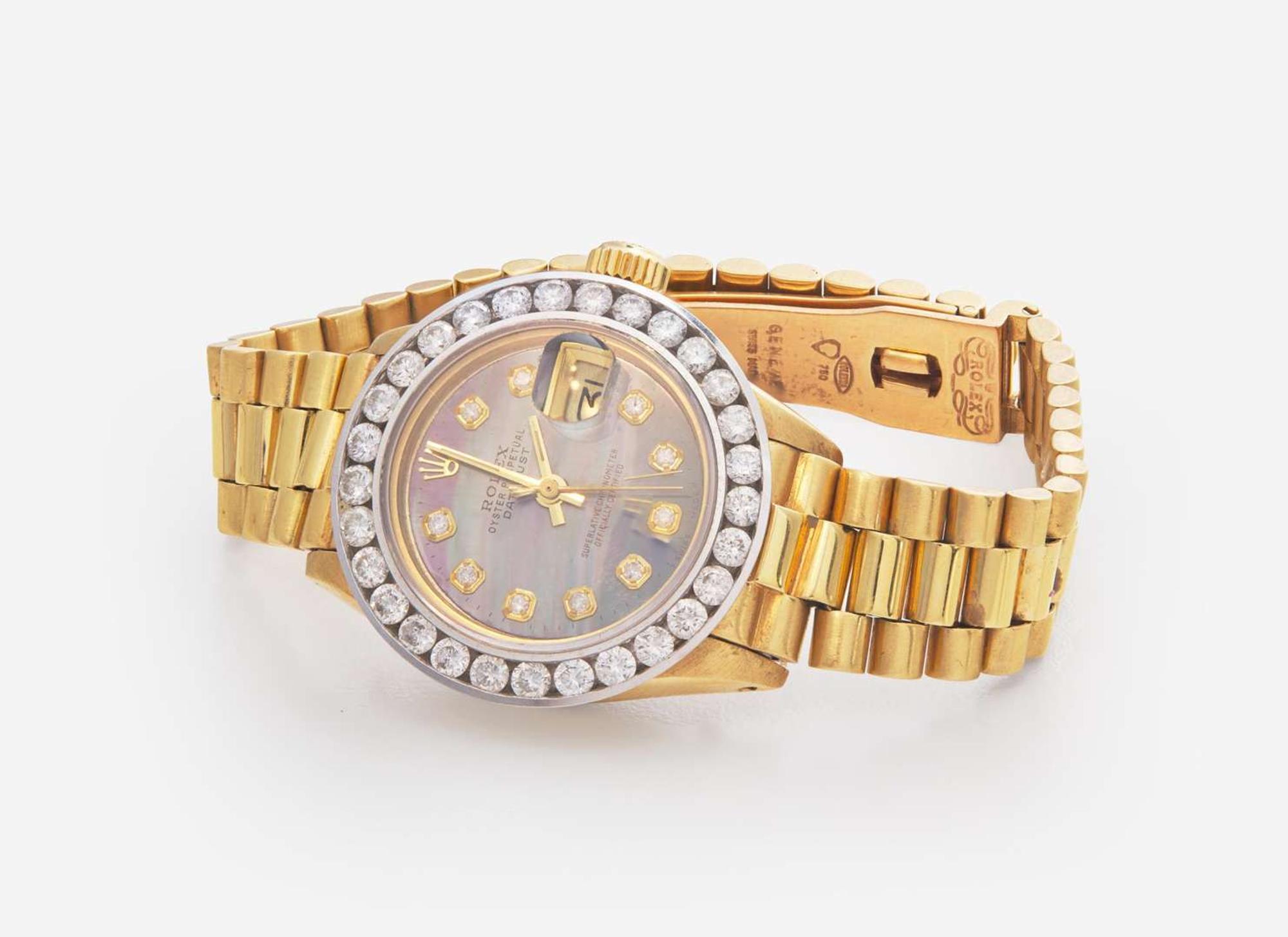 A Ladies 18K Yellow Gold, Mother-of Pearl, and Diamond Presidential Rolex