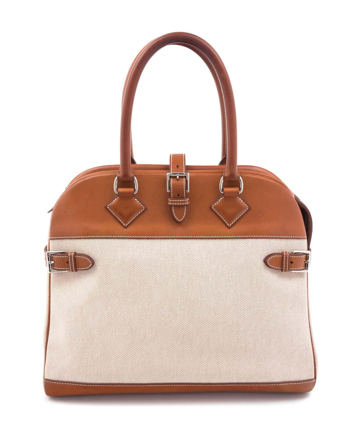 An Hermes Brown Leather and Canvas 35cm Atlas Handbag, 14" x 12" x 5".