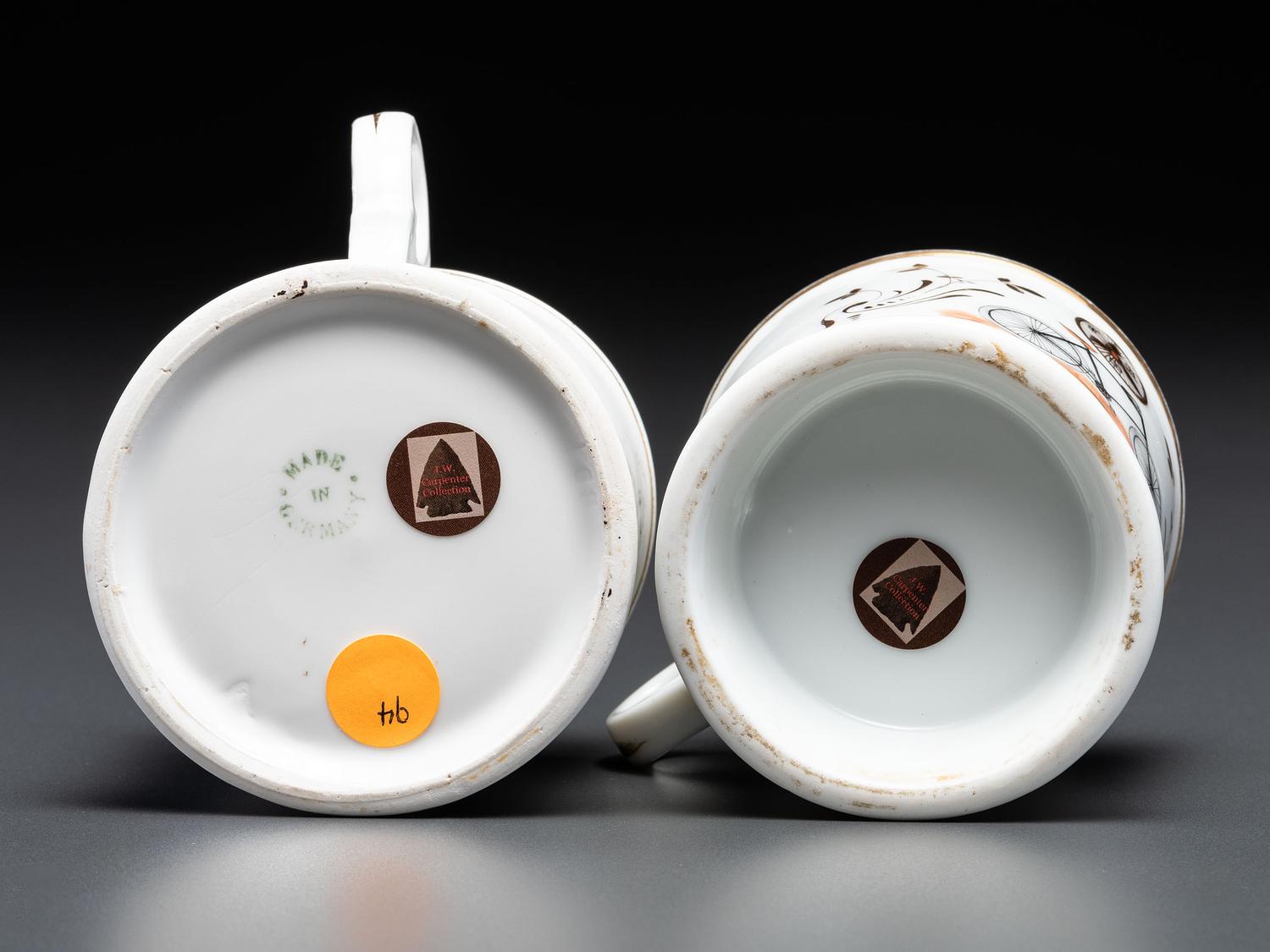 Two Cyclist's Porcelain Shaving Mugs