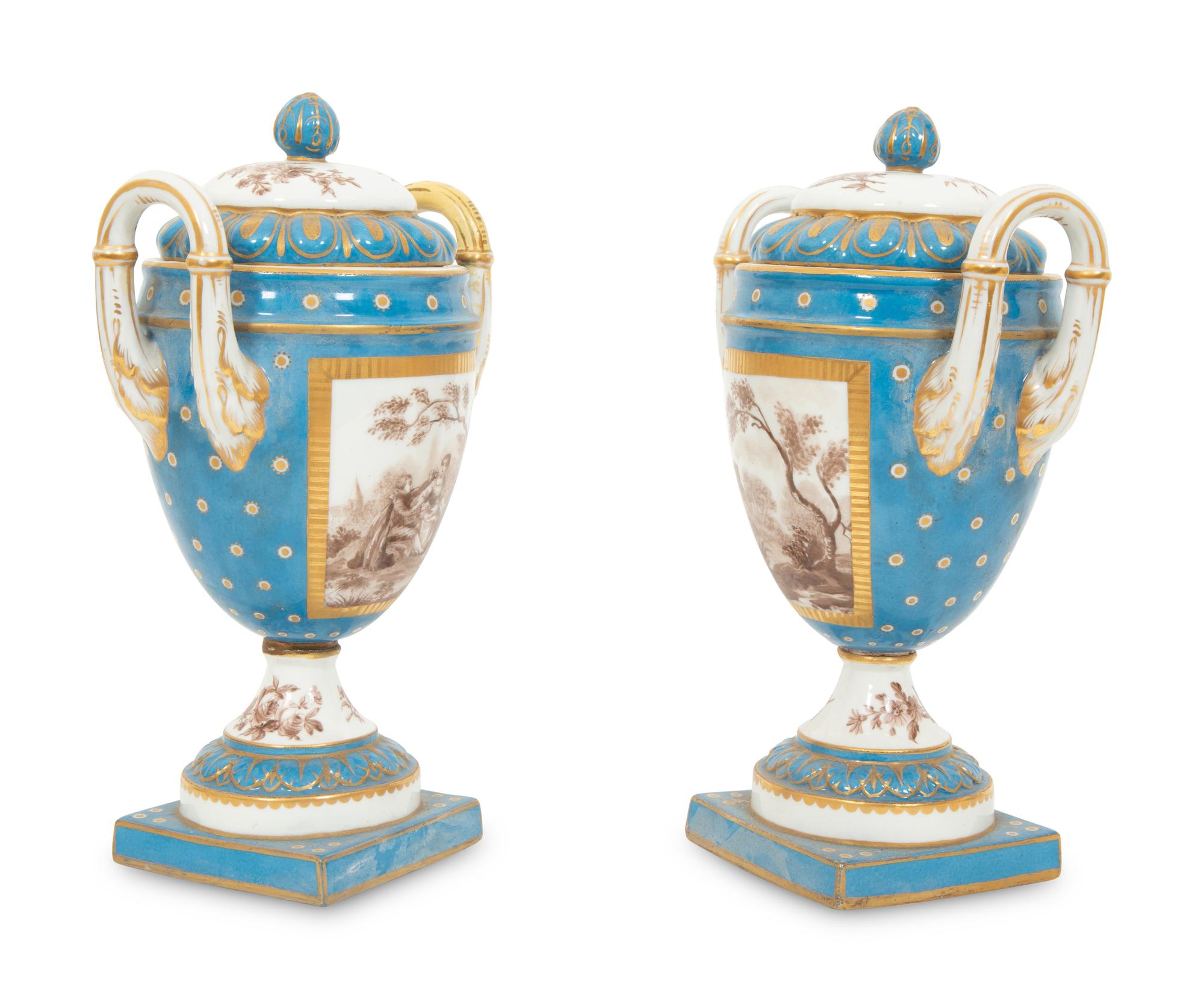 A Pair of S è vres Style Porcelain Covered Urns