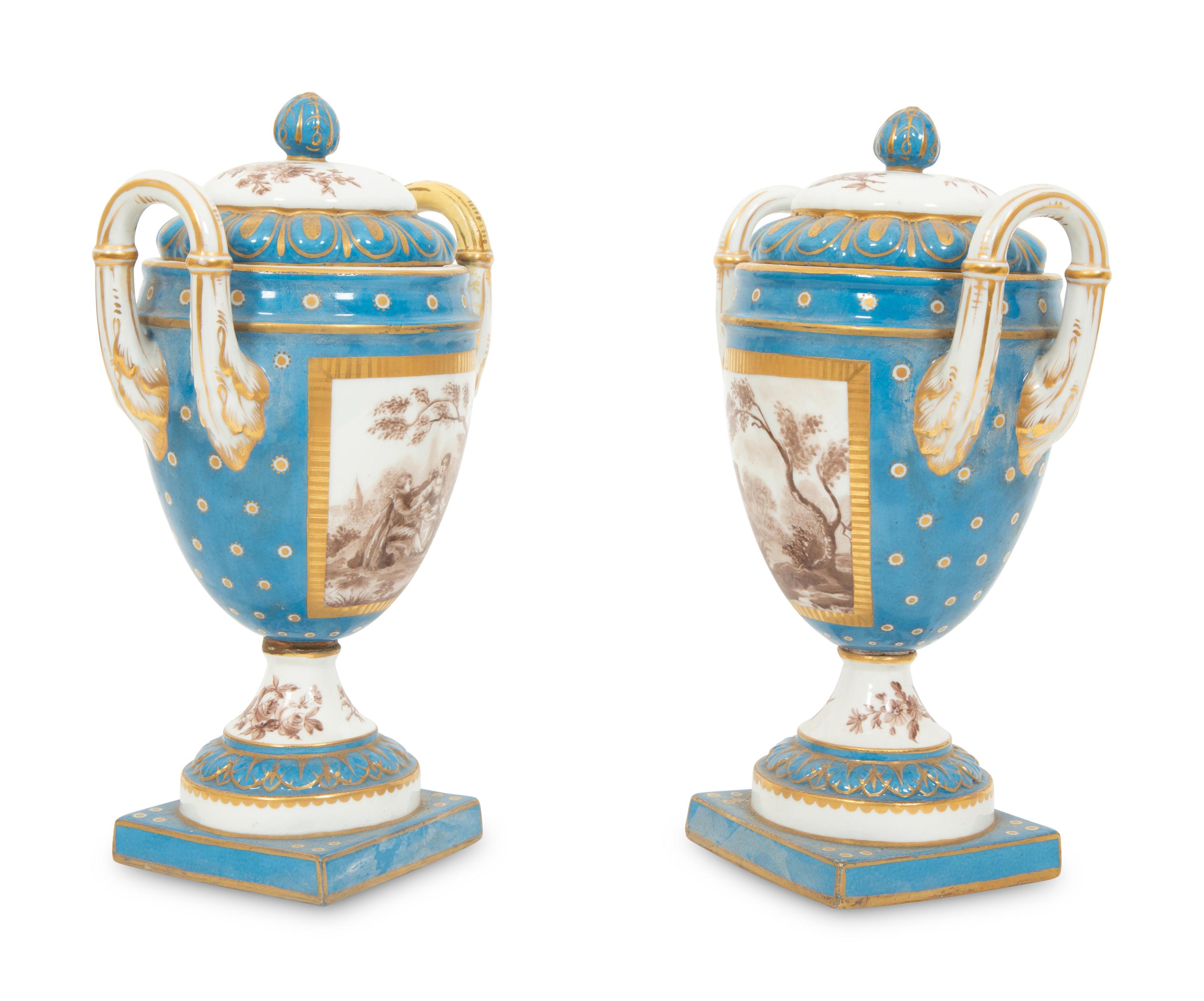 A Pair of S è vres Style Porcelain Covered Urns