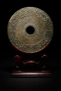 A Chinese Liangzhu-s tyle Carved Nephrite Jade Bi Disc