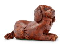 An Omersa & Co. Leather ‘Puppy’ Foot Stool