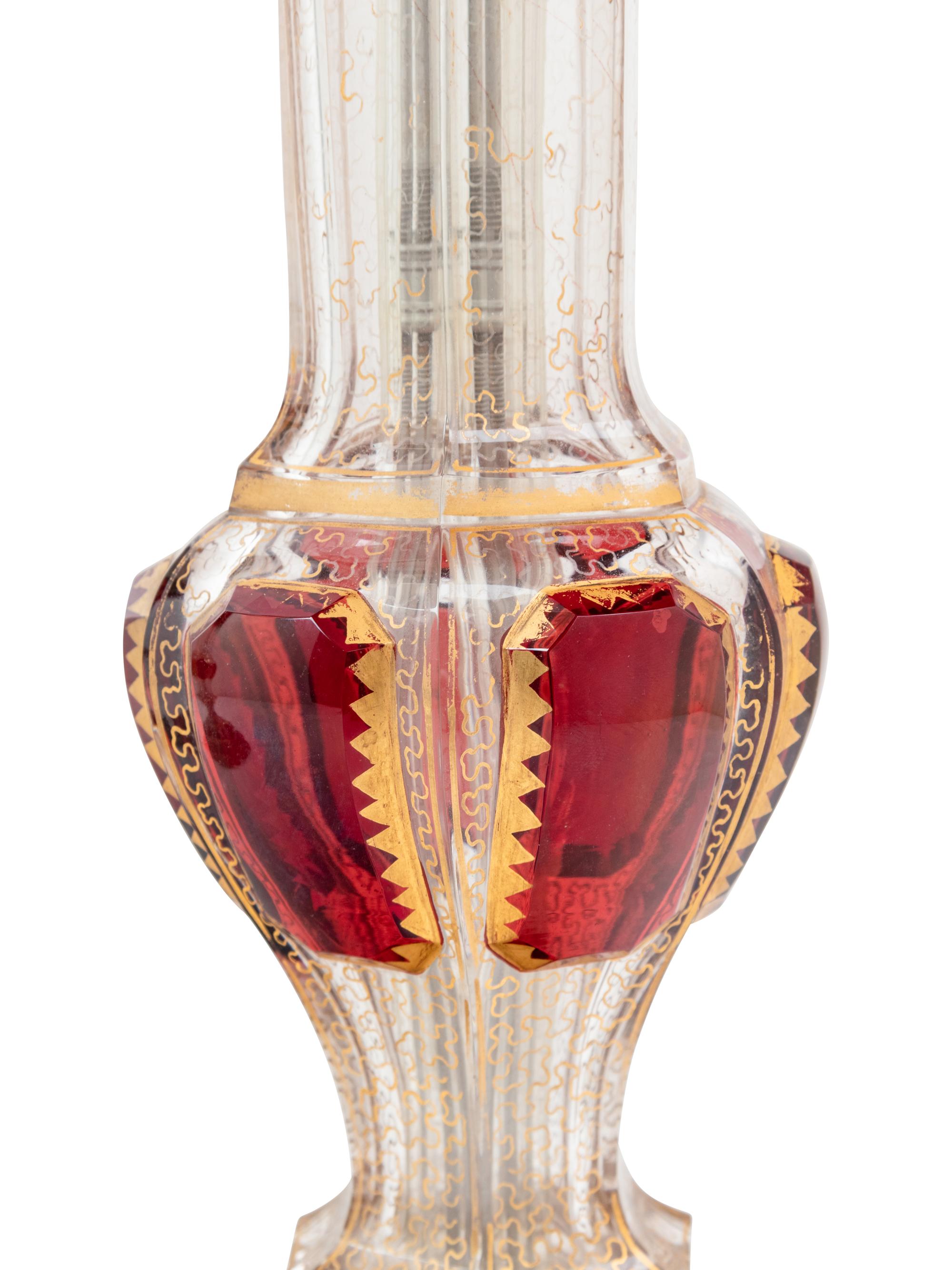 A Pair of Bohemian Cranberry and Clear Glass Vases Mounted as Lamps