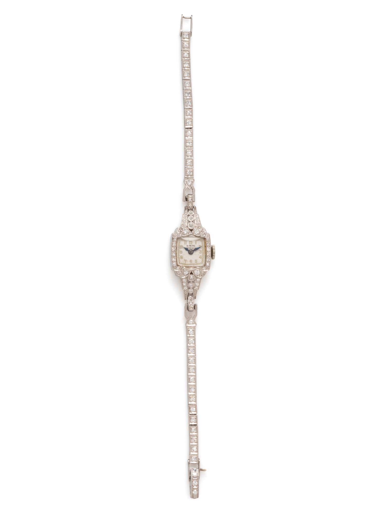 GIRARD PERREGAUX, PLATINUM AND DIAMOND WATCH