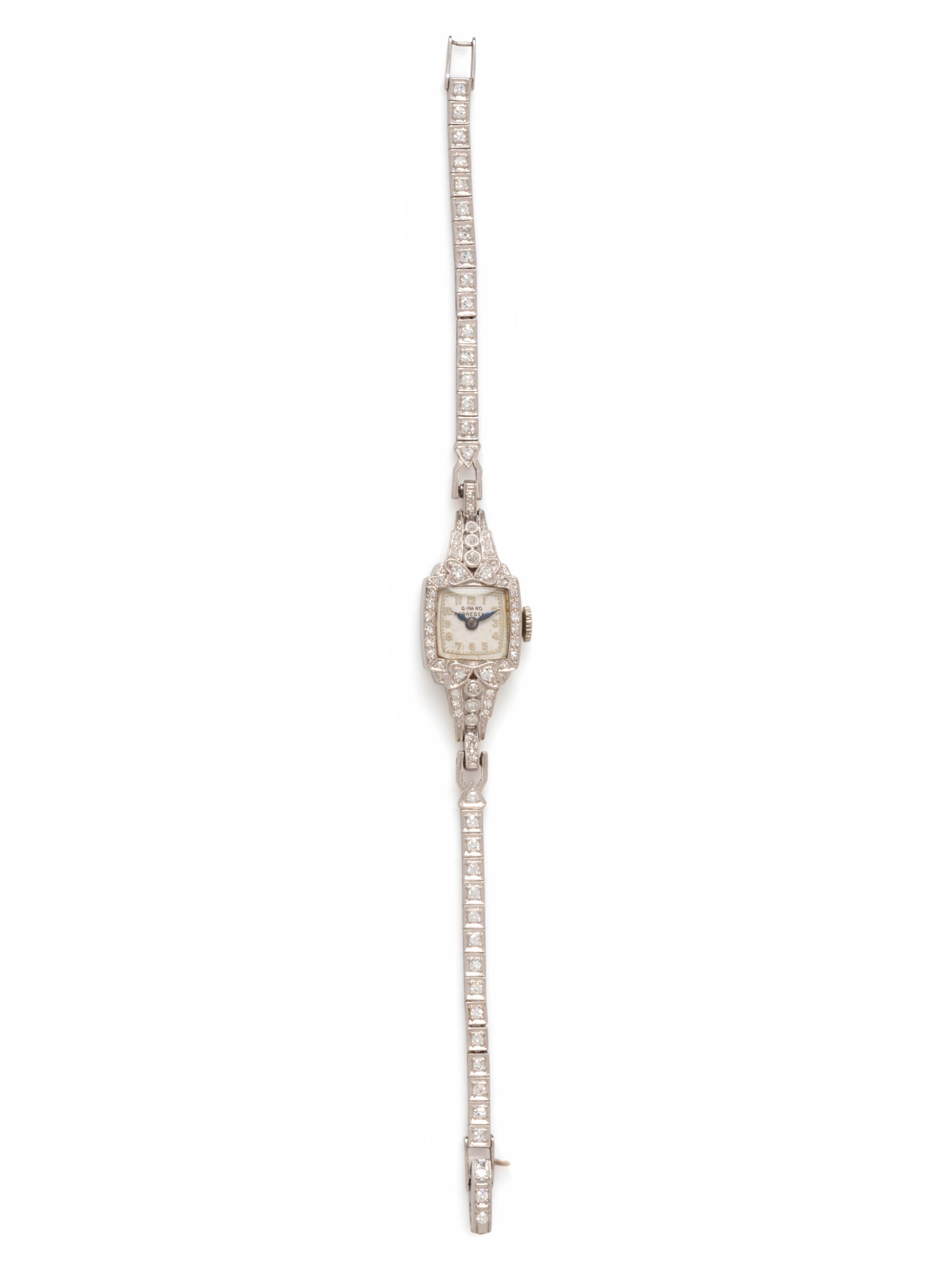 GIRARD PERREGAUX, PLATINUM AND DIAMOND WATCH