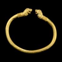 A Greek or Achaemenid Gold Bracelet with Lion Terminals