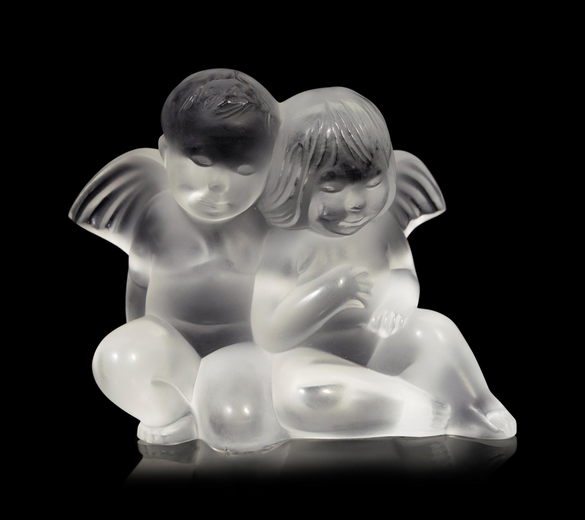 Four Lalique Cherub Figures