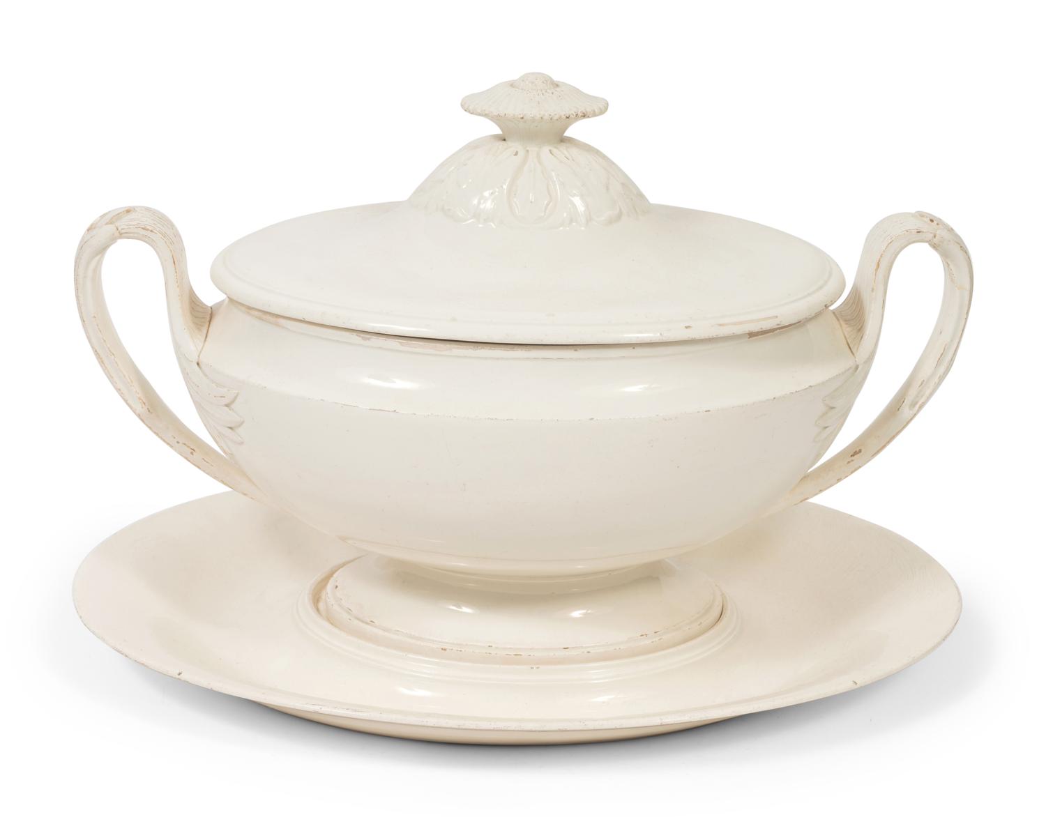 A French White Glazed Faïence Tureen and Underplate