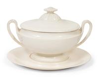 A French White Glazed Faïence Tureen and Underplate