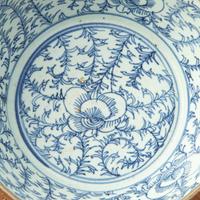 A Set of Eight Chinese Export Brown Glazed and Blue and White Bowls