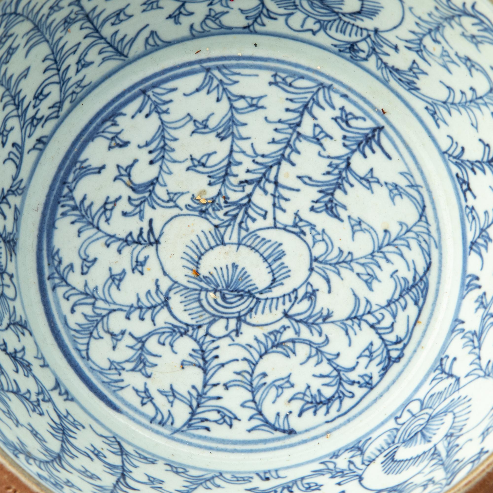 A Set of Eight Chinese Export Brown Glazed and Blue and White Bowls