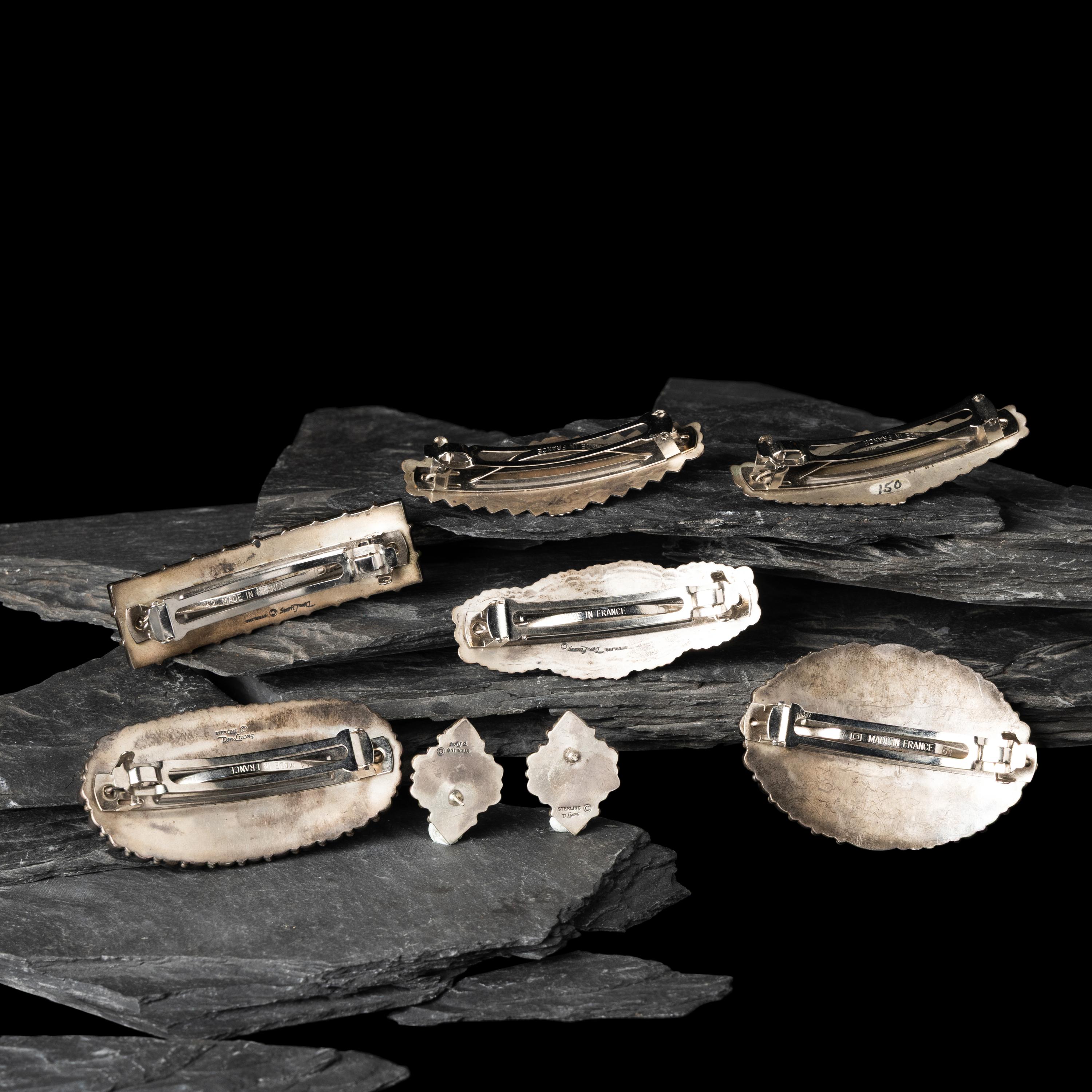 Don Lucas (American, 20th century) — Southwestern-style Sterling Silver and Cluster Inlay Hair Barrettes and Post Earrings