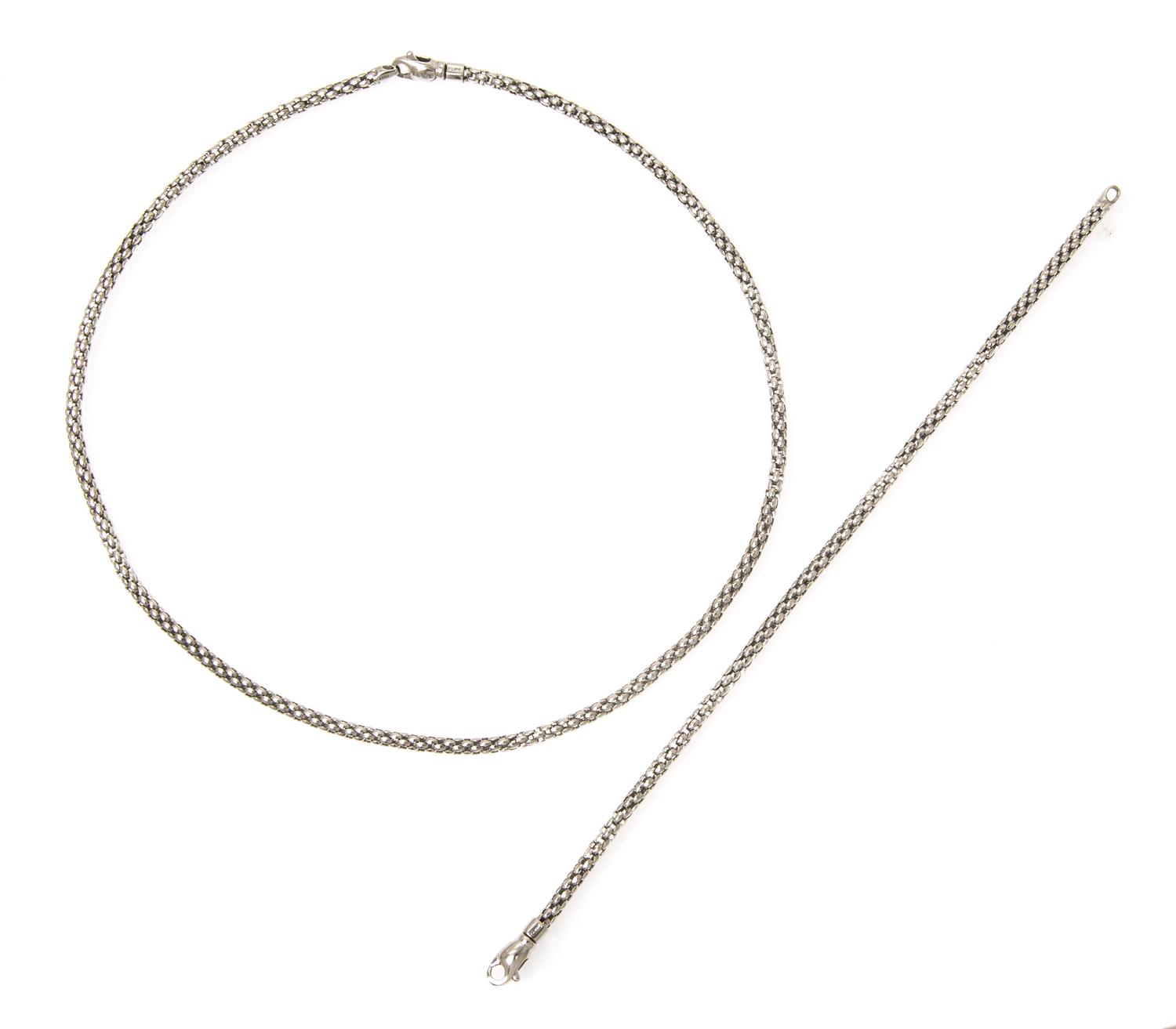 An 18 Karat White Gold Demi Parure, Fope, 15.10 dwts.