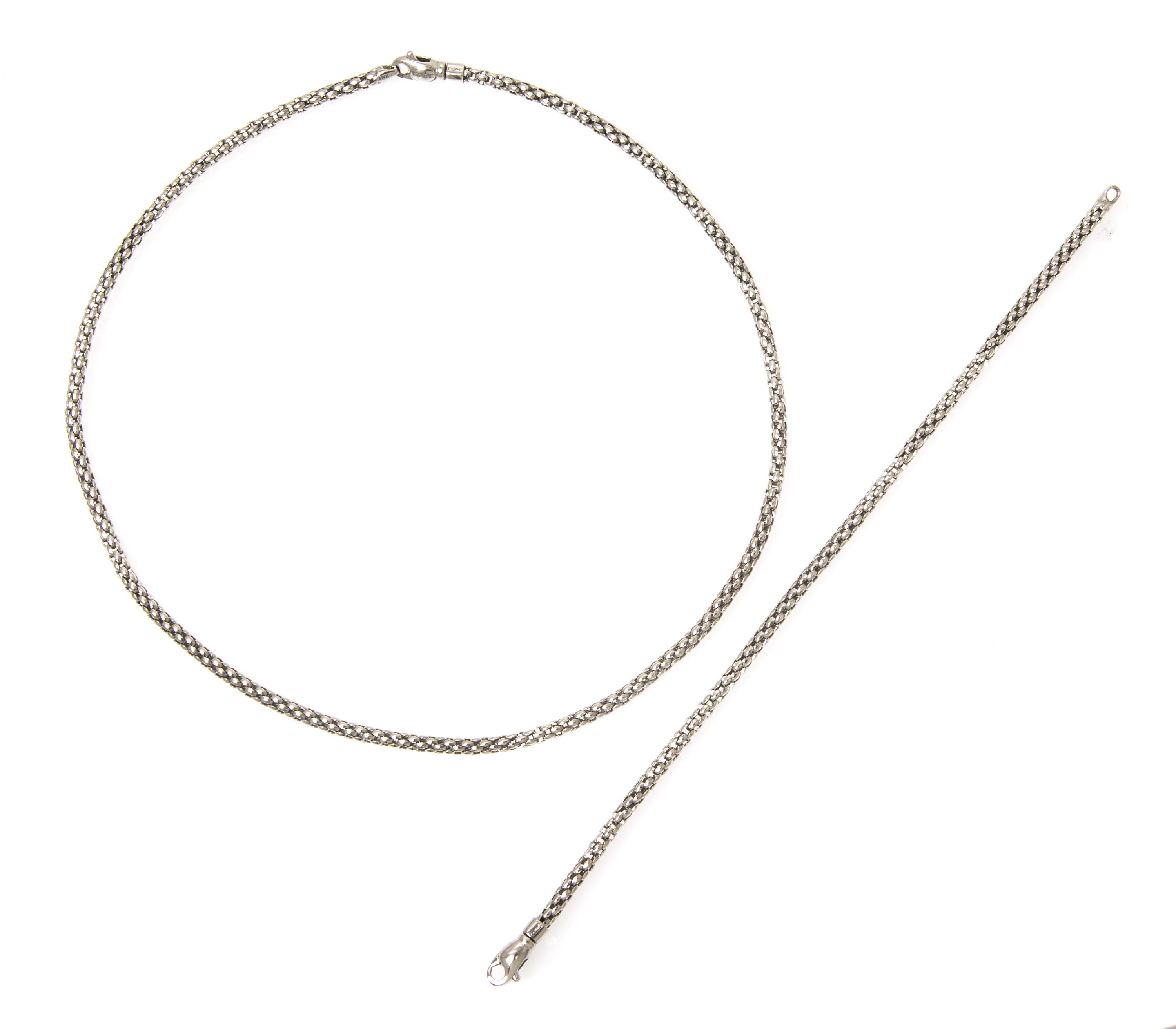 An 18 Karat White Gold Demi Parure, Fope, 15.10 dwts.