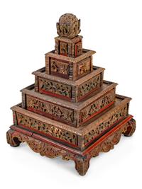 A Mongolian Gilt and Red Lacquered Carved Wood Stand