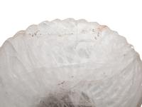 A Large Fluted Rock Crystal Bowl on a Painted Wood Stand