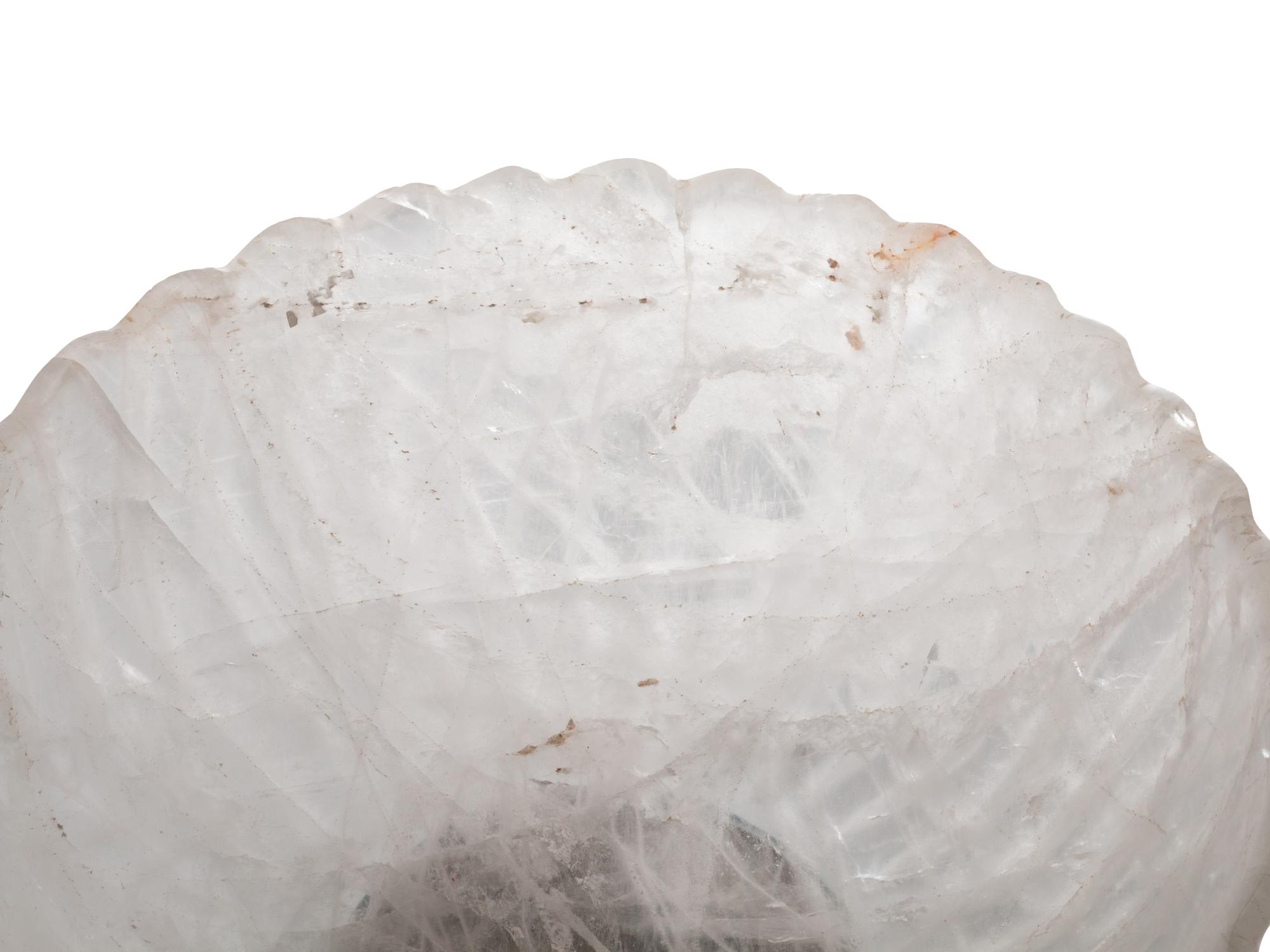 A Large Fluted Rock Crystal Bowl on a Painted Wood Stand