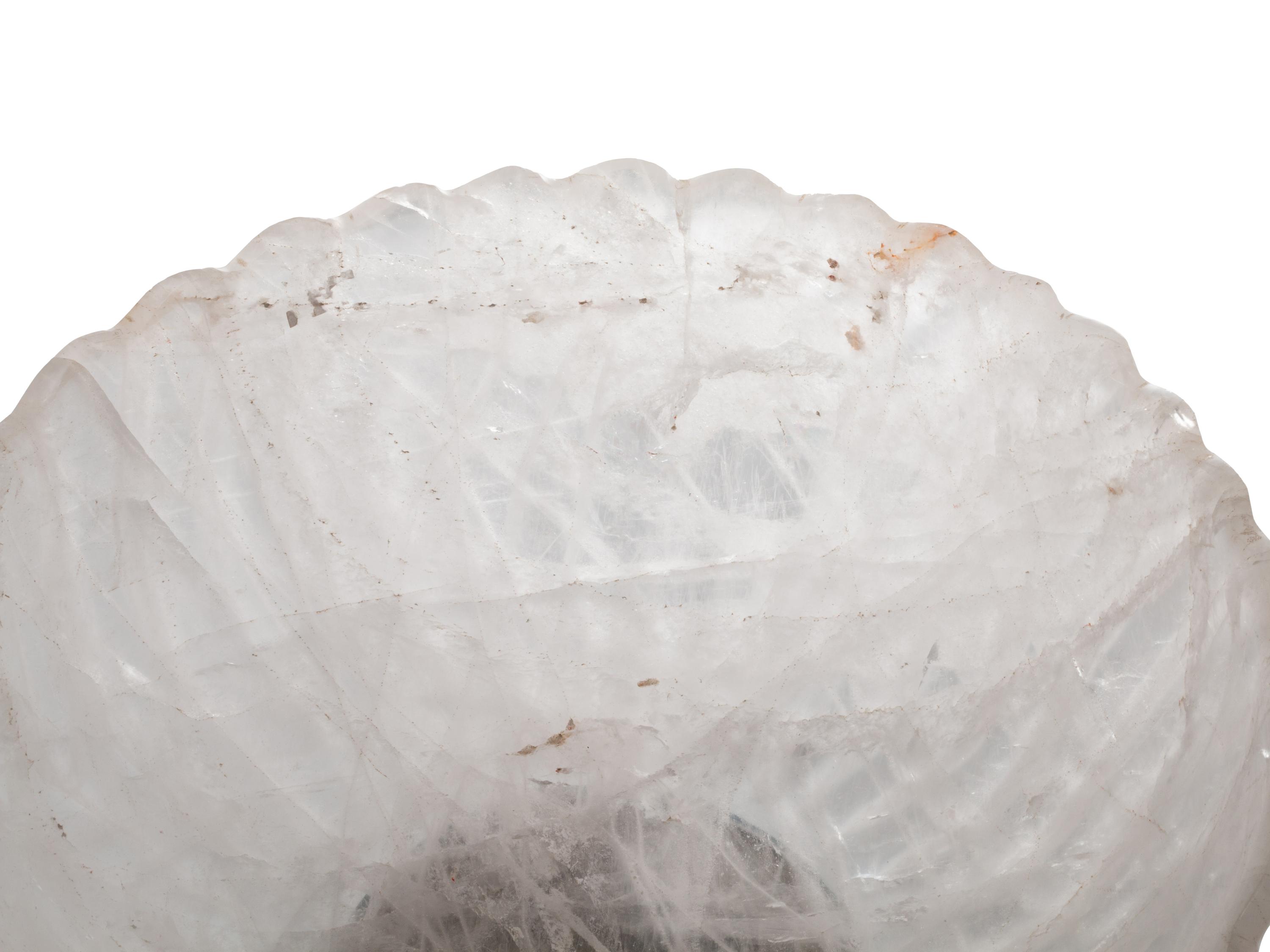 A Large Fluted Rock Crystal Bowl on a Painted Wood Stand