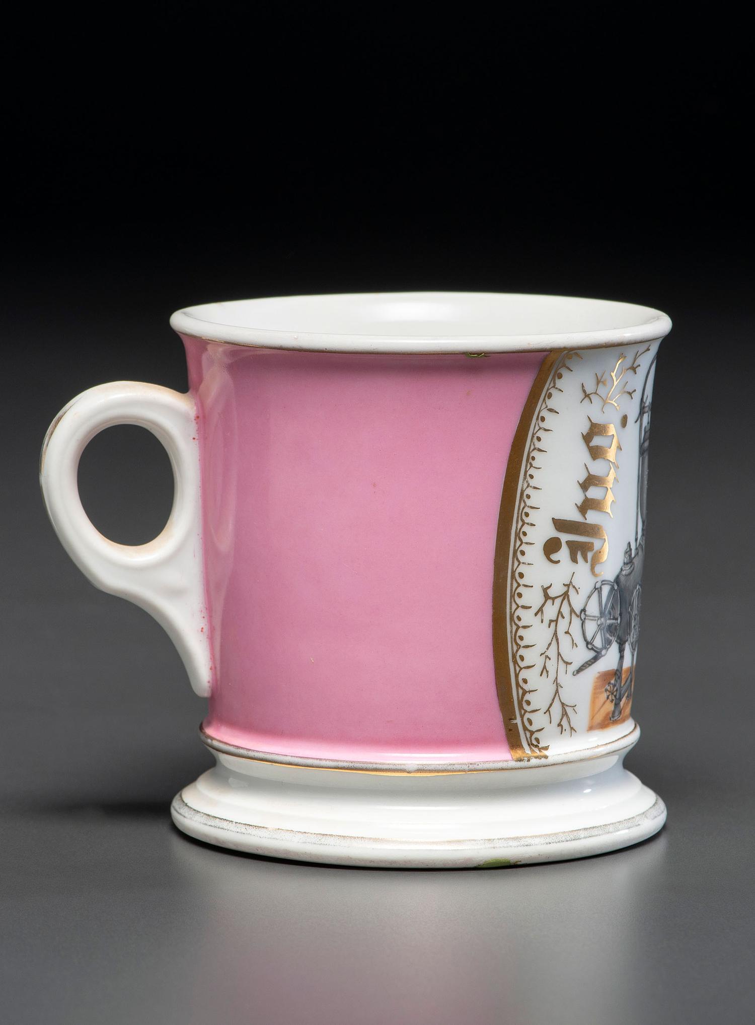 A Porcelain Shaving Mug Depicting A Steam Pump