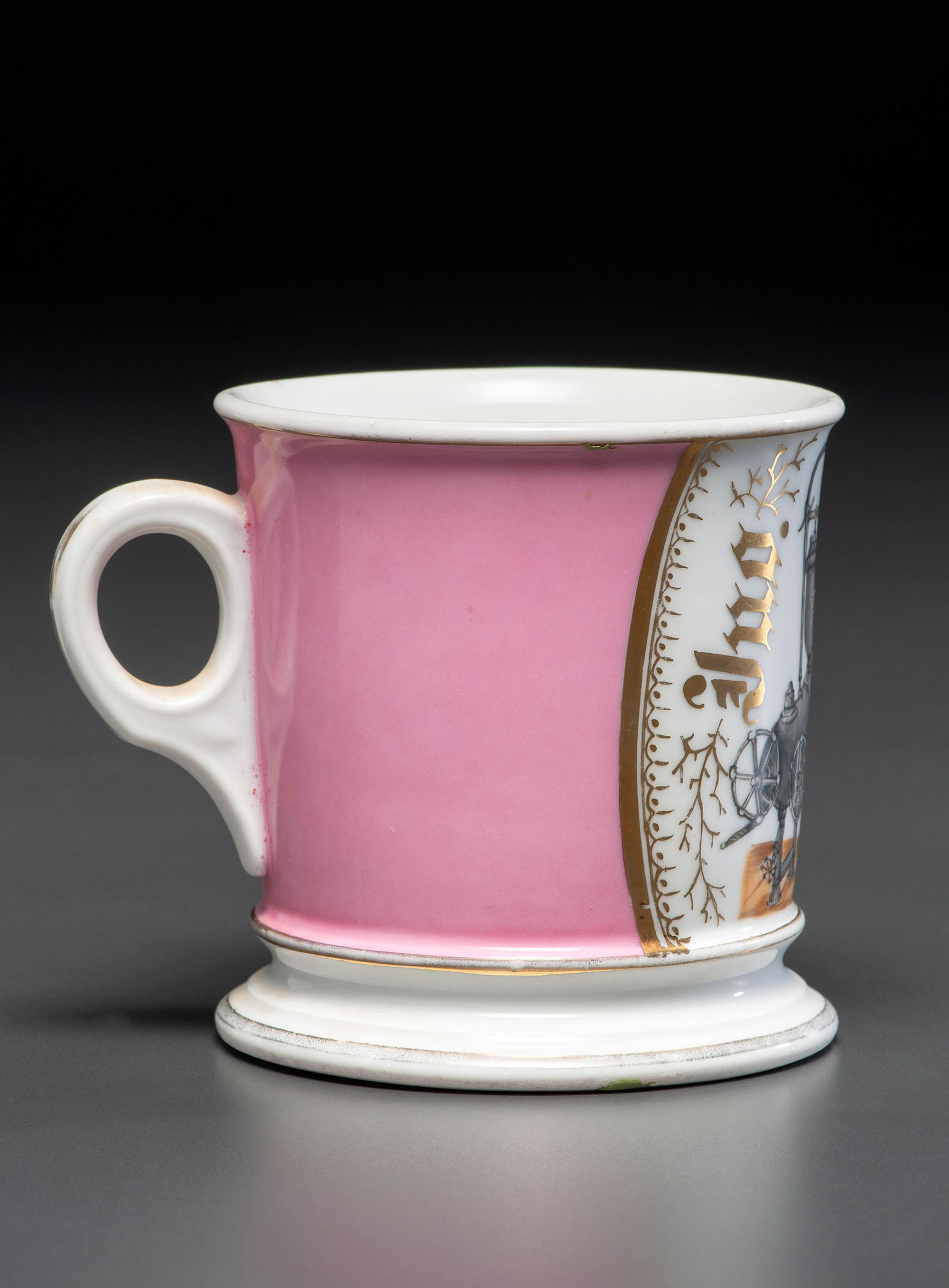 A Porcelain Shaving Mug Depicting A Steam Pump