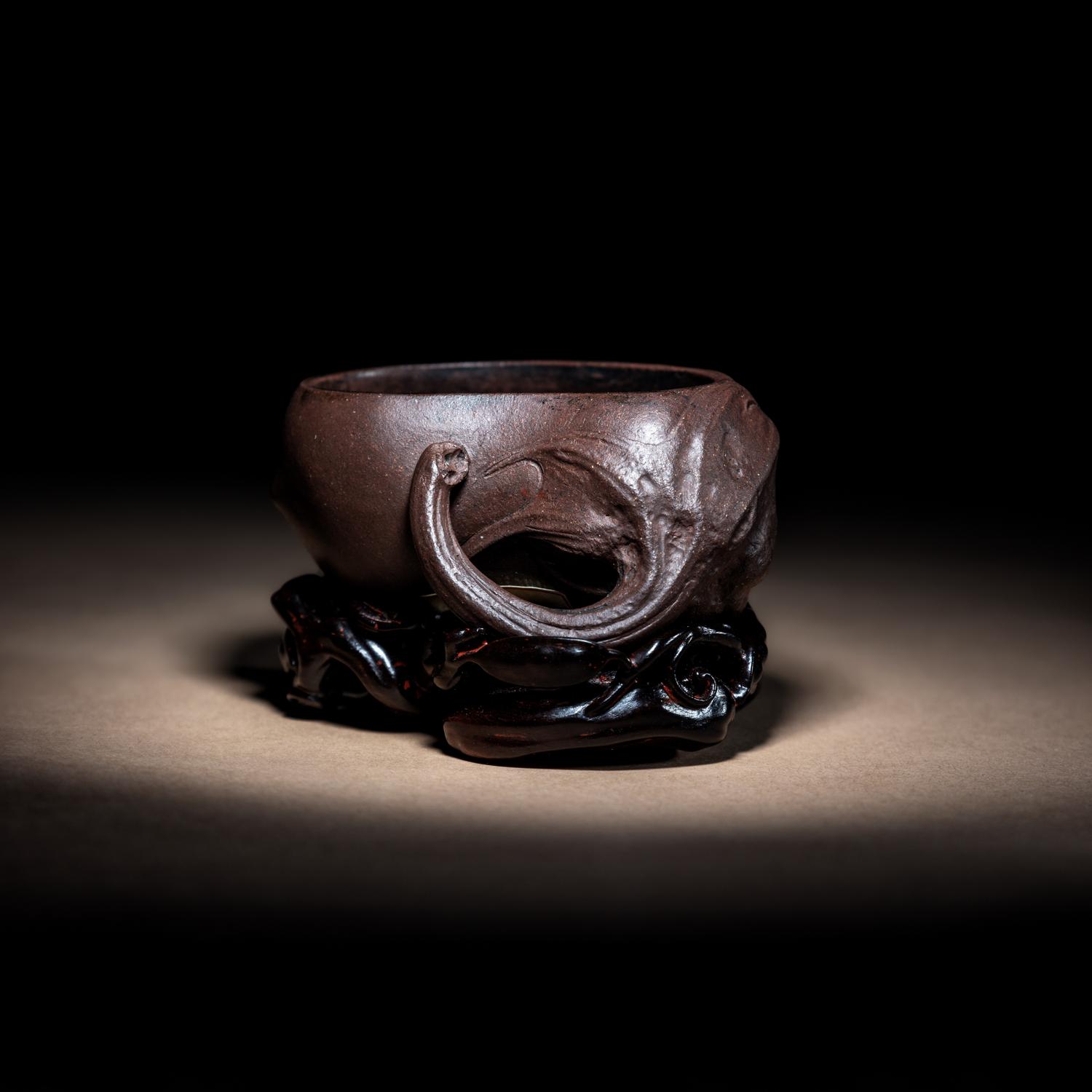 A Rare Yixing 'Eggplant' Coupe with Impressed Seal 'Yuan' and Wood Stand 陳鳴遠款秋茄水注