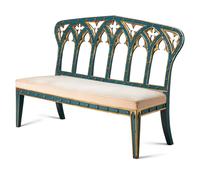 A Pair of English Gothic Revival Painted and Parcel Gilt Settees