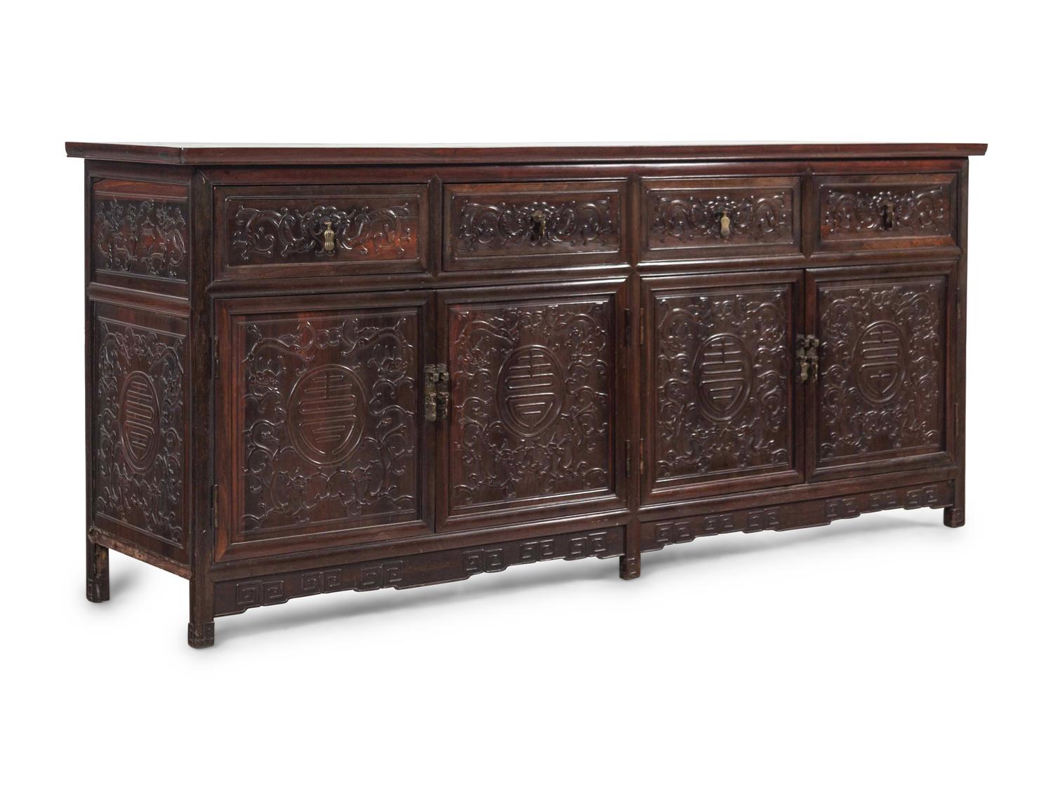 A Chinese Export Carved Hardwood Console Cabinet