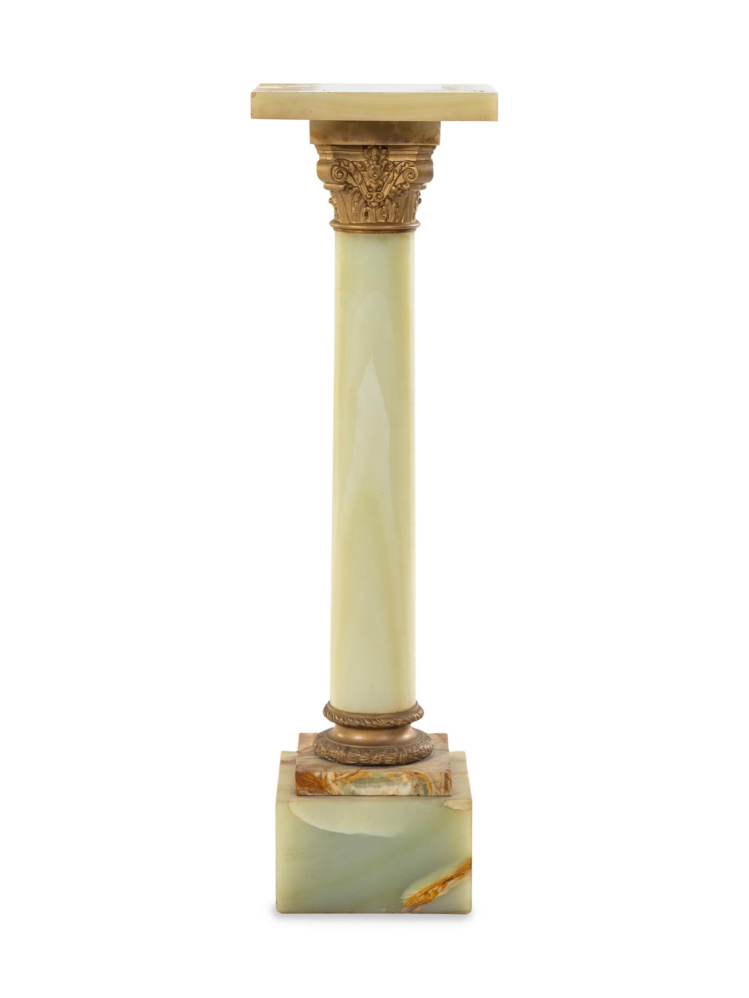 A Continental Gilt Bronze and Onyx Pedestal