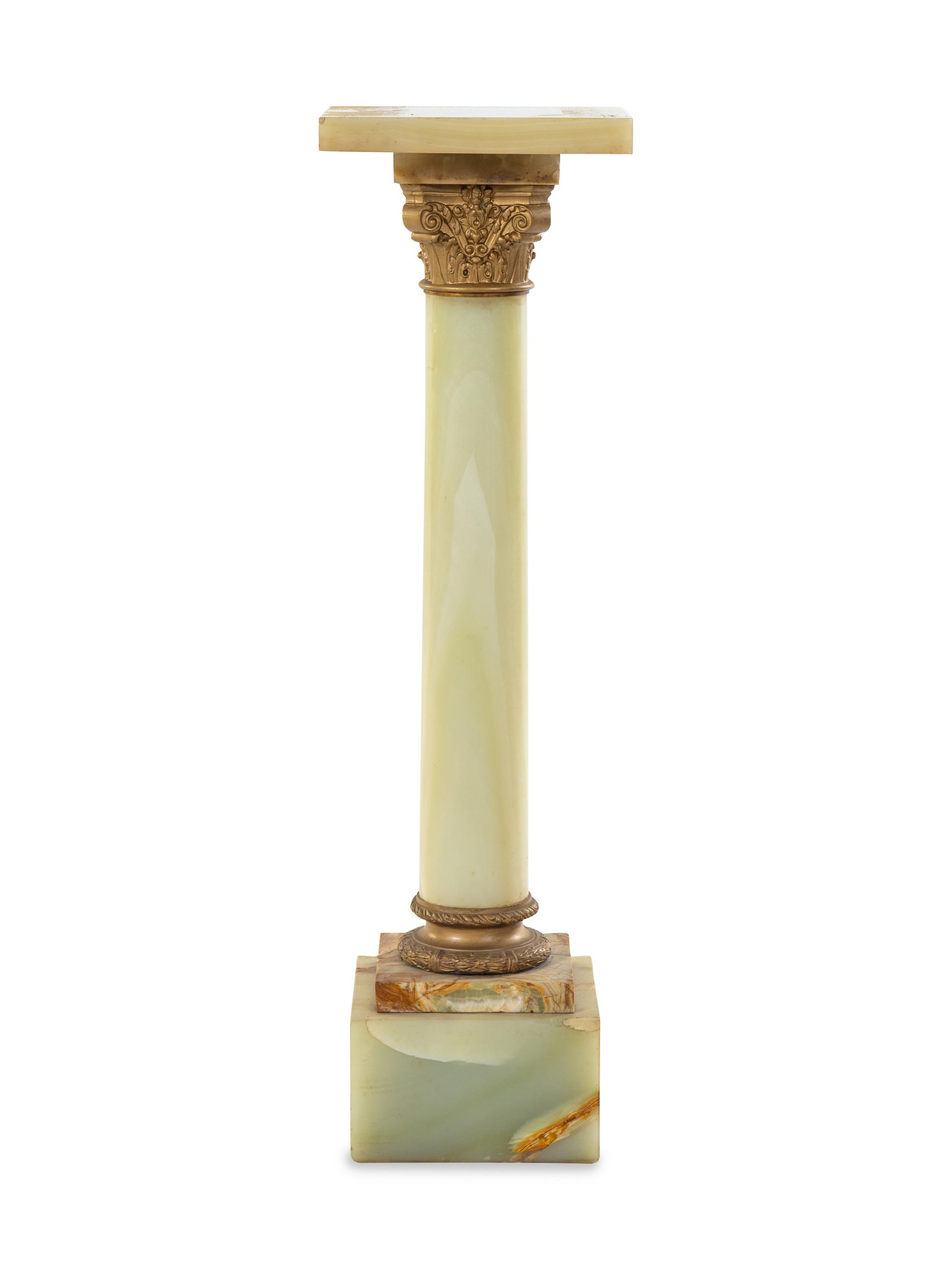 A Continental Gilt Bronze and Onyx Pedestal