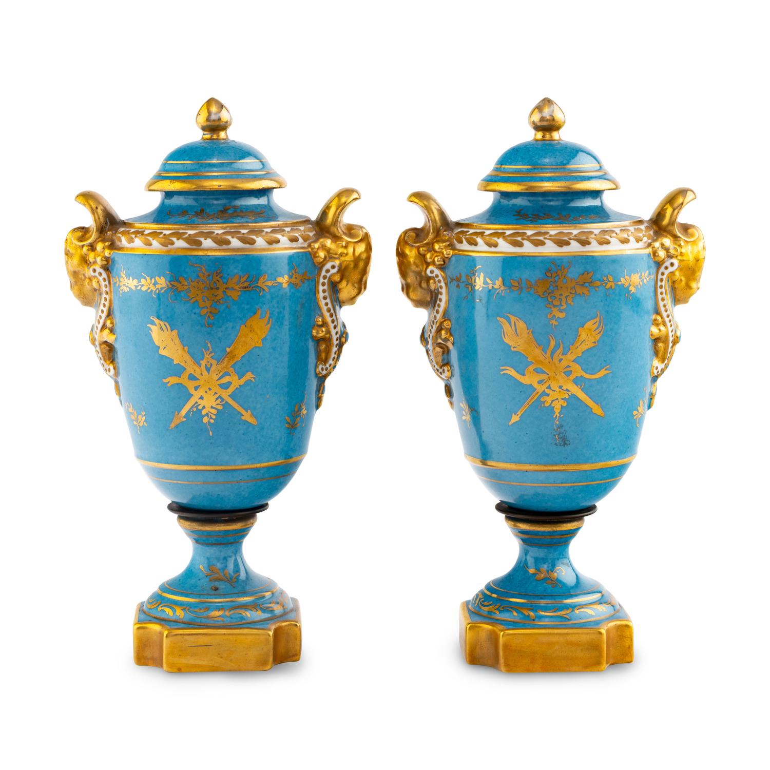 A Pair of Sèvres Style Porcelain Urns