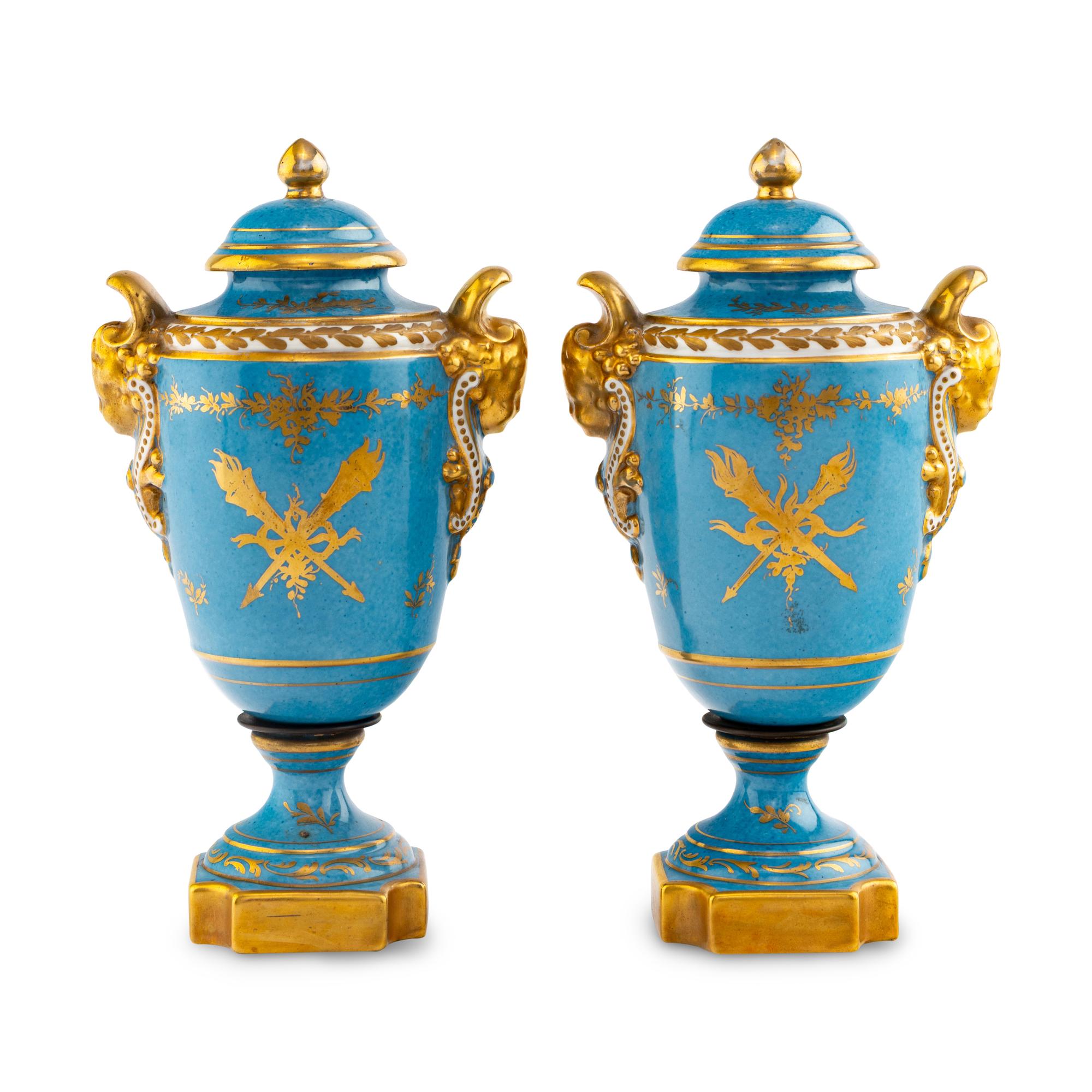 A Pair of Sèvres Style Porcelain Urns