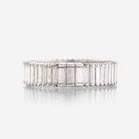 A diamond and eighteen karat white gold ring