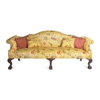 A Chippendale Style Carved Mahogany Camelback Sofa