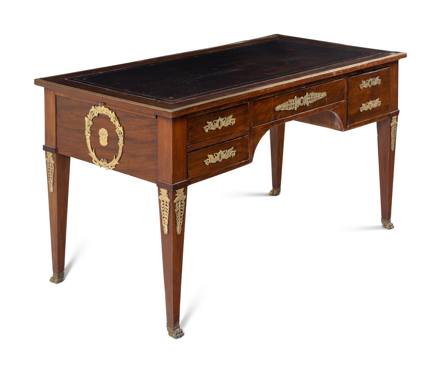 An Empire Style Gilt Metal Mounted Mahogany Bureau Plat and an Associated Armchair