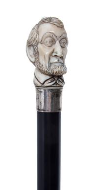 An American Ivory Automaton Handled Cane, Length of handle 2 5/8 x length overall 36 1/8 inches.