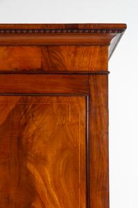 A Regency Mahogany Armoire Simulating a Linen Press