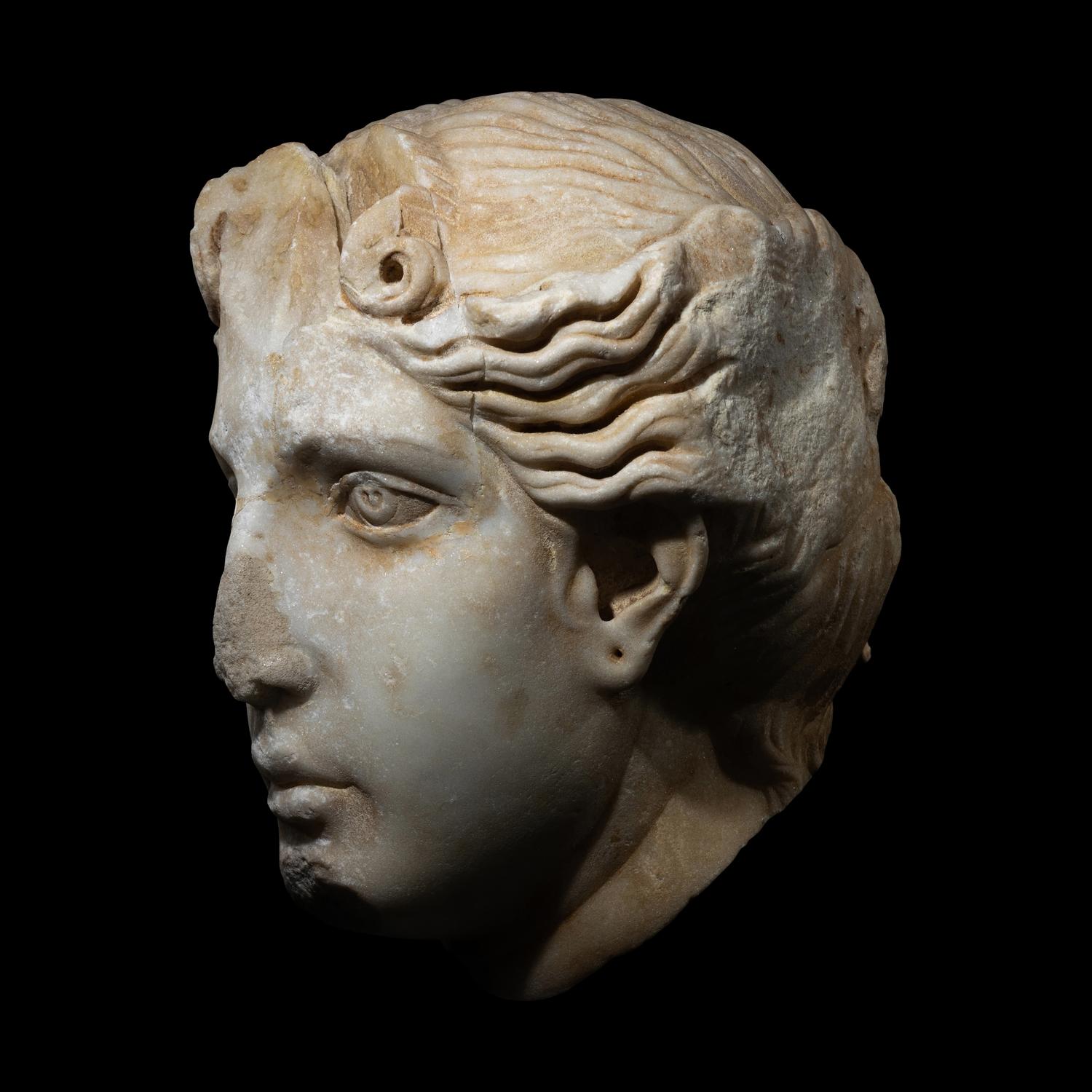 A Roman Marble Head of a Goddess
