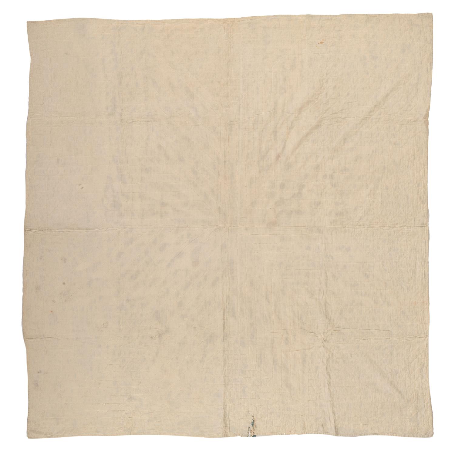 A Star Patterned Pieced Quilt